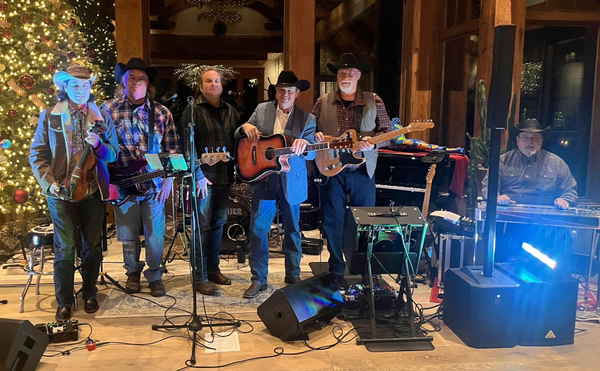Picture of our North Carolina tribute to George Strait band holding their instruments before their performance at a private event | Altus Entertainment